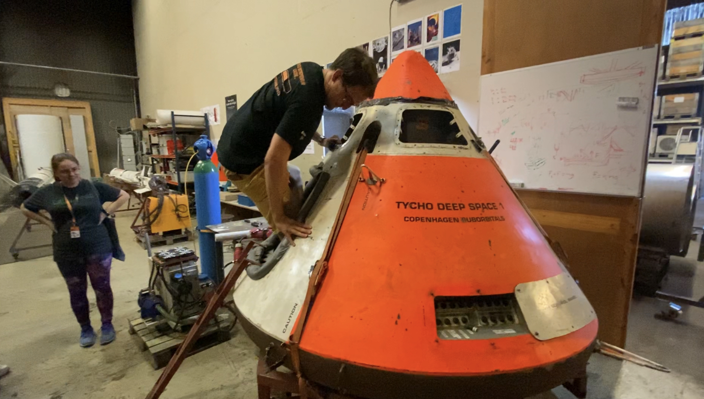 During the ESA BIC Denmark Launchpad entrepreneurship pre-incubation programme the participants visited the Danish launcher company Copenhagen Suborbitals and tried out the tight astronaut capsule. Image credit: ESA BIC Denmark