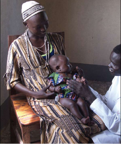 Doctor examining a baby