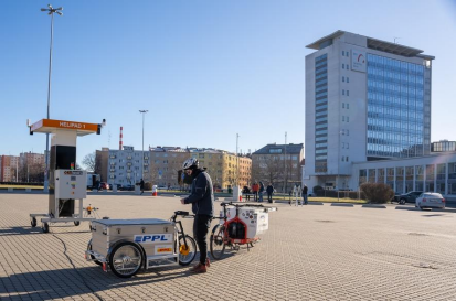 Figure 4 - Bike cargo delivery to helipad in Brno Exhibition Centre